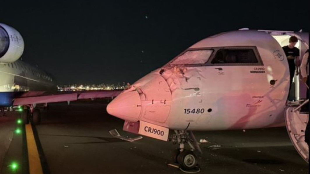 Două avioane au intrat în coliziune pe pista aeroportului LaGuardia din New York